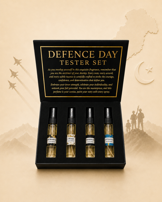Tester Set, Scents Enclave — open black presentation box holding four sample sprays, sepia Defence Day backdrop